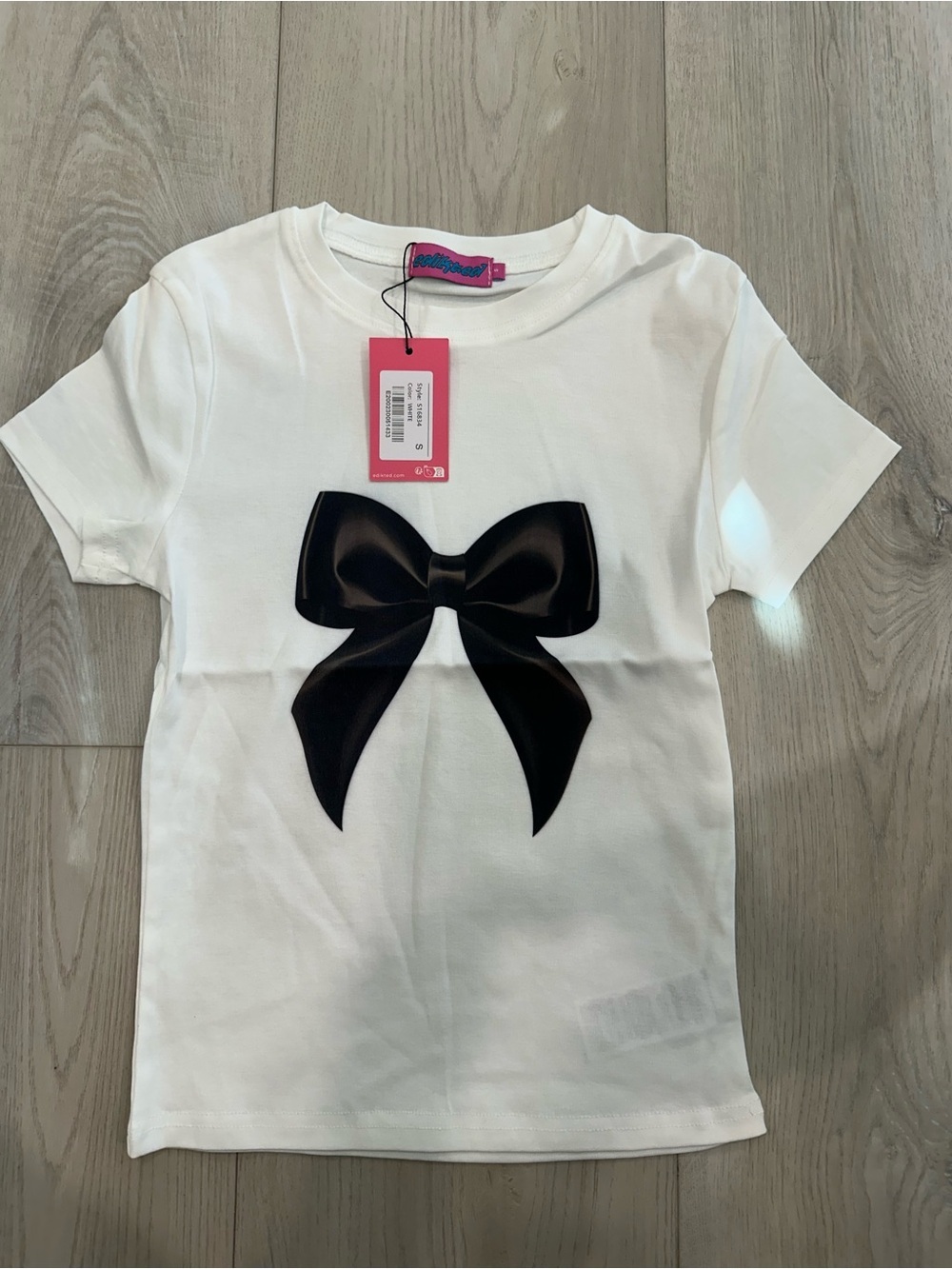 Edikted White Short Sleeve Tee with Black Bow Graphic
